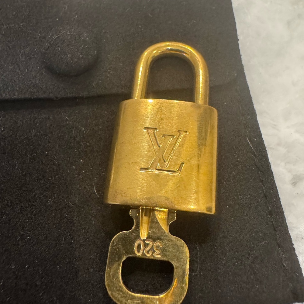 Louis Vuitton Shiny Gold Lock